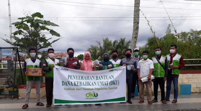 Kolaborasi Yakesma dan Pegadaian Syariah Bagikan Bantuan untuk Warga